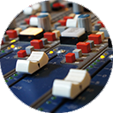 Closeup of audio mixing console.